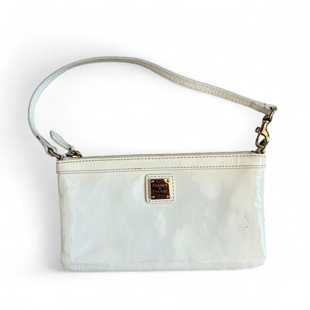 Dooney & Bourke cream patent leather wristlet